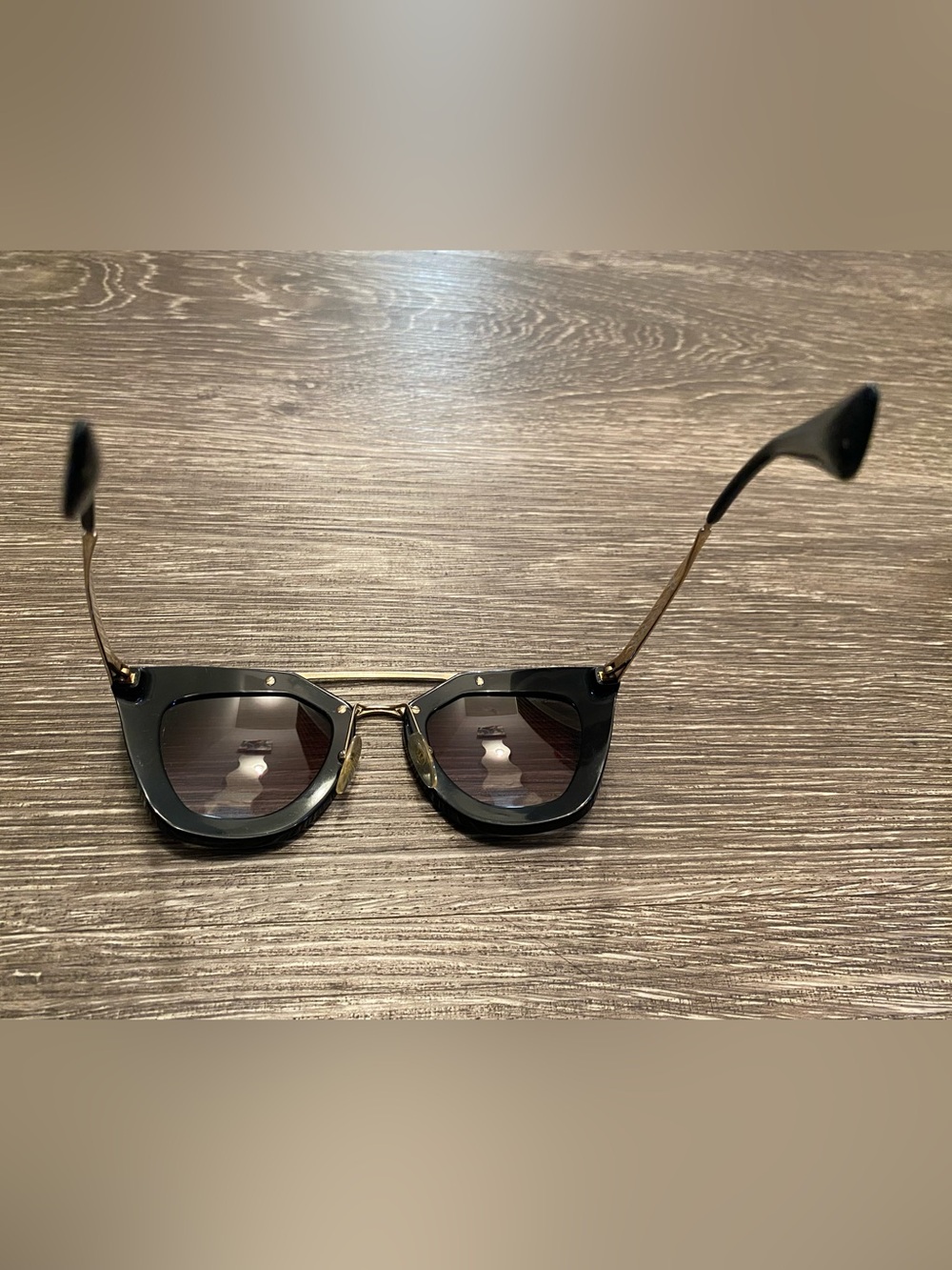 Prada Black Frame Cat-Eye Sunglasses with Gold Bridge - Picture 4 of 7